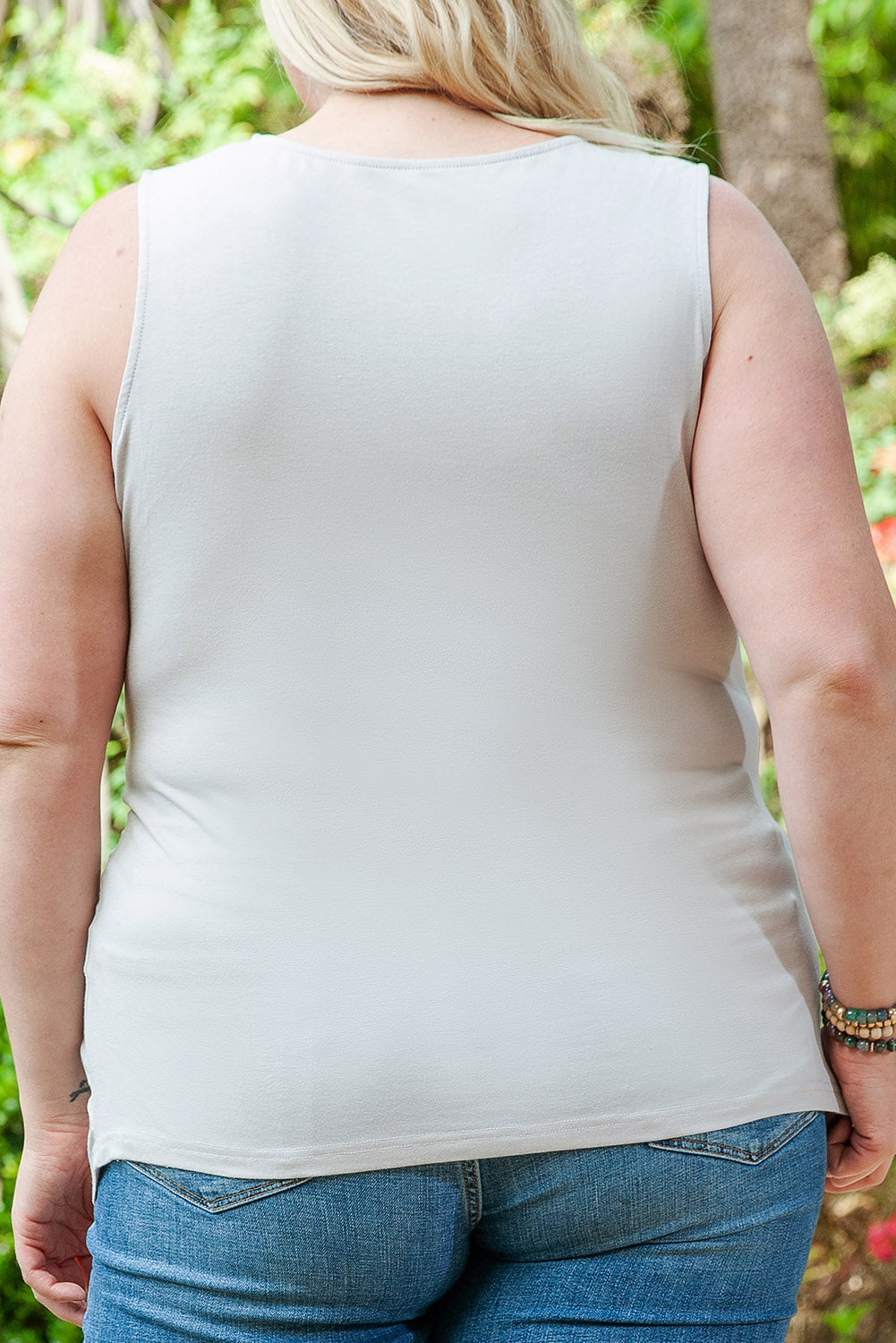 Be the envy of your friends in this O-neck, sleeveless Twist Front Knot Tank Top! This ultra-flattering top features a twist front design to cinch your waist for an oh-so-slim silhouette. Crafted with a super soft and lightweight fabric blend of 65% Polyester, 30% Viscose, and 5% Elastane, this tank is sure to be a go-to in your wardrobe! Get yours today from Moodz Boutique!