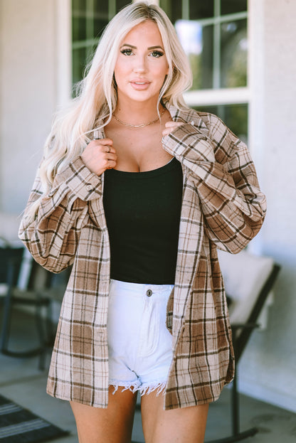 This fab shacket is the perfect finishing touch to your cold-weather look! With classic Plaid, plus convenient and stylish flap pockets, it'll easily tie together any outfit. Dress it up with a top, trousers, or jeans - it's 100% Polyester! Brown bliss awaits at Moodz Boutique.