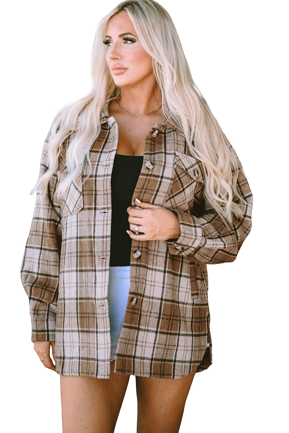 This fab shacket is the perfect finishing touch to your cold-weather look! With classic Plaid, plus convenient and stylish flap pockets, it'll easily tie together any outfit. Dress it up with a top, trousers, or jeans - it's 100% Polyester! Brown bliss awaits at Moodz Boutique.