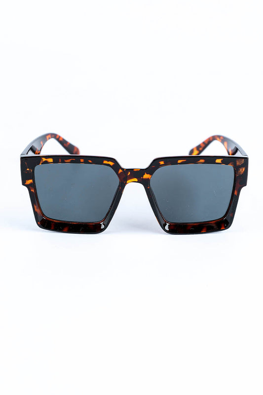 Black Amber Frame Retro Squares. A fashion-forward, oversized statement. Tall, thick rims, sturdy nose bridge, and angular lenses – they have it all! Random case color selected for the win. Crafted from 100% ABS material.