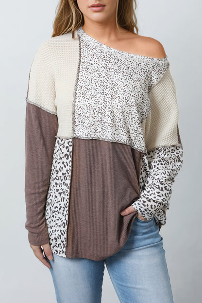 Blusa de punto con textura y patchwork en bloques de colores de leopardo 