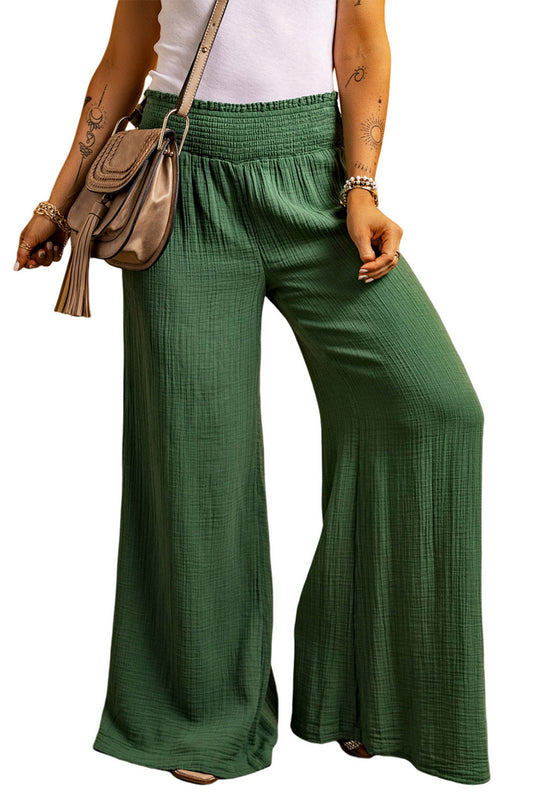 Pantalones anchos con cintura fruncida y arrugados de color verde