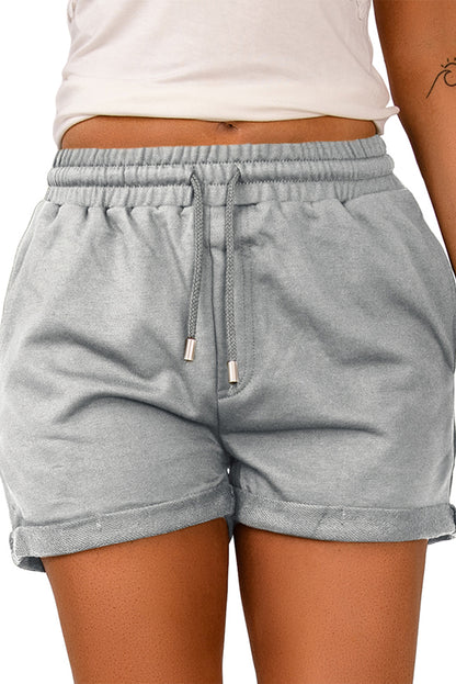 Score these Tie Waist Cuffed Lounge Shorts for major style points! They're timeless—they'll never go out of fashion. Plus, pockets on the sides make 'em great for carrying must-haves like keys and phone. We know you'll swoon over the lightweight feel and the oh-so-soft fabric—75% Polyester 25% Cotton in colors like Green, Gray, and Black.