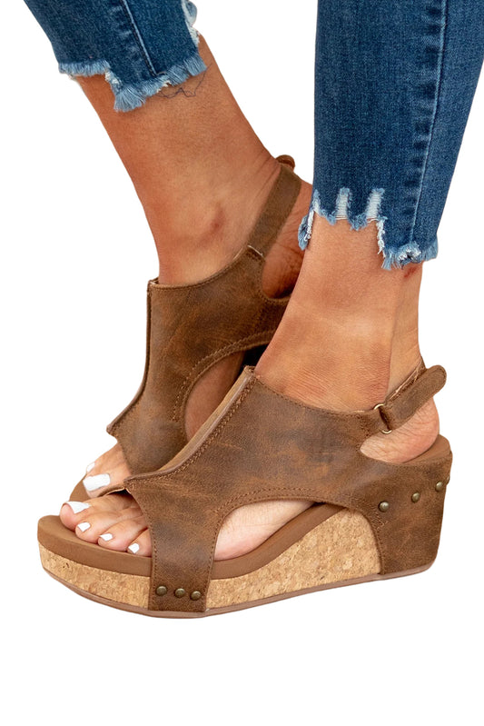 Vintage-y design plus a hint of modern flair - like you, but better! Leather-y stitching for an edgy texture and trend-savvy vibes Studs that add oomph and personality to any ensemble Comfort-meets-style wedge heel for all-day struttability!