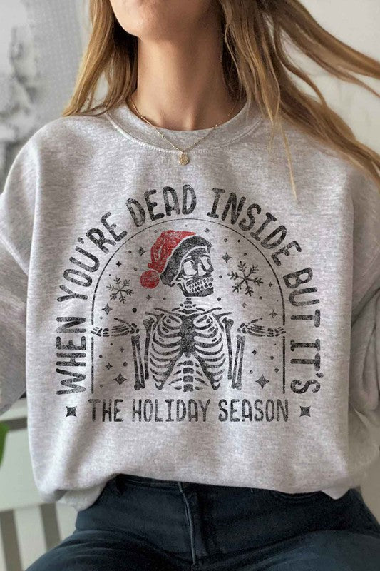 SUDADERA GRÁFICA CON ESQUELETO NAVIDEÑO