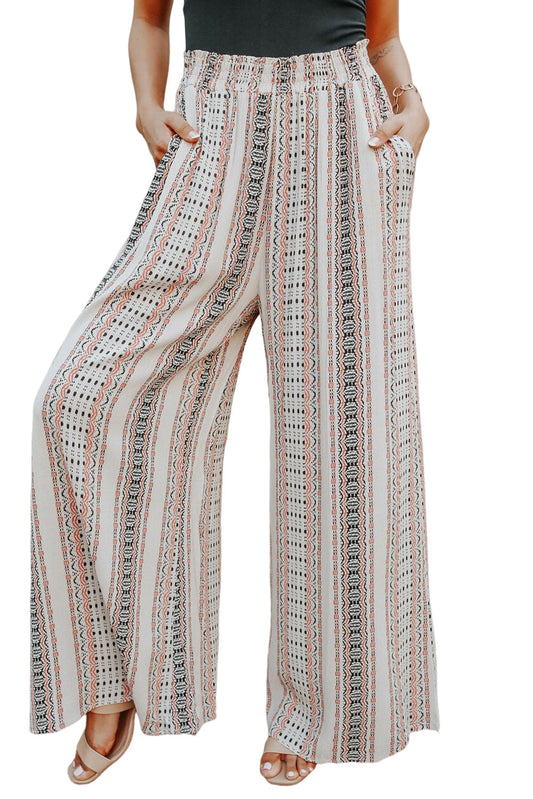 Pantalones anchos fruncidos con estampado geométrico en color beige