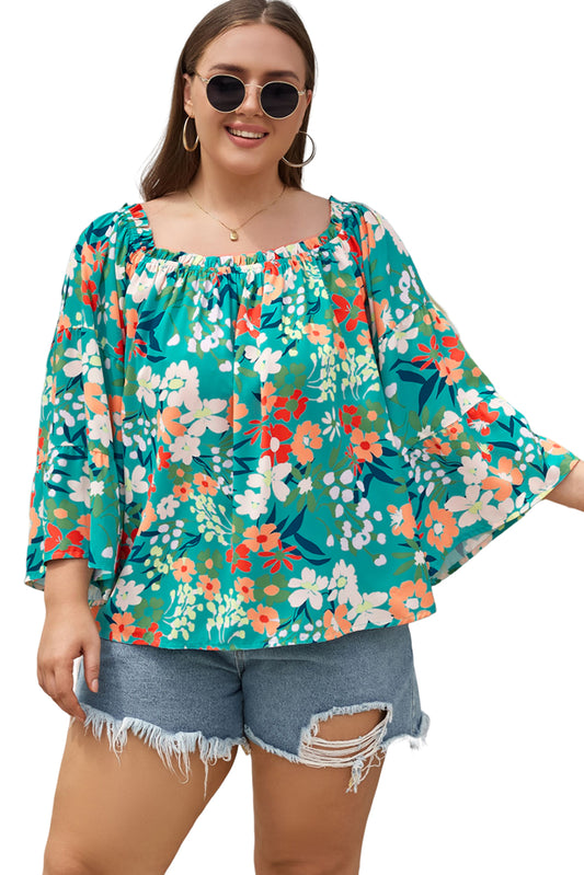 Blusa con volantes y hombros descubiertos 