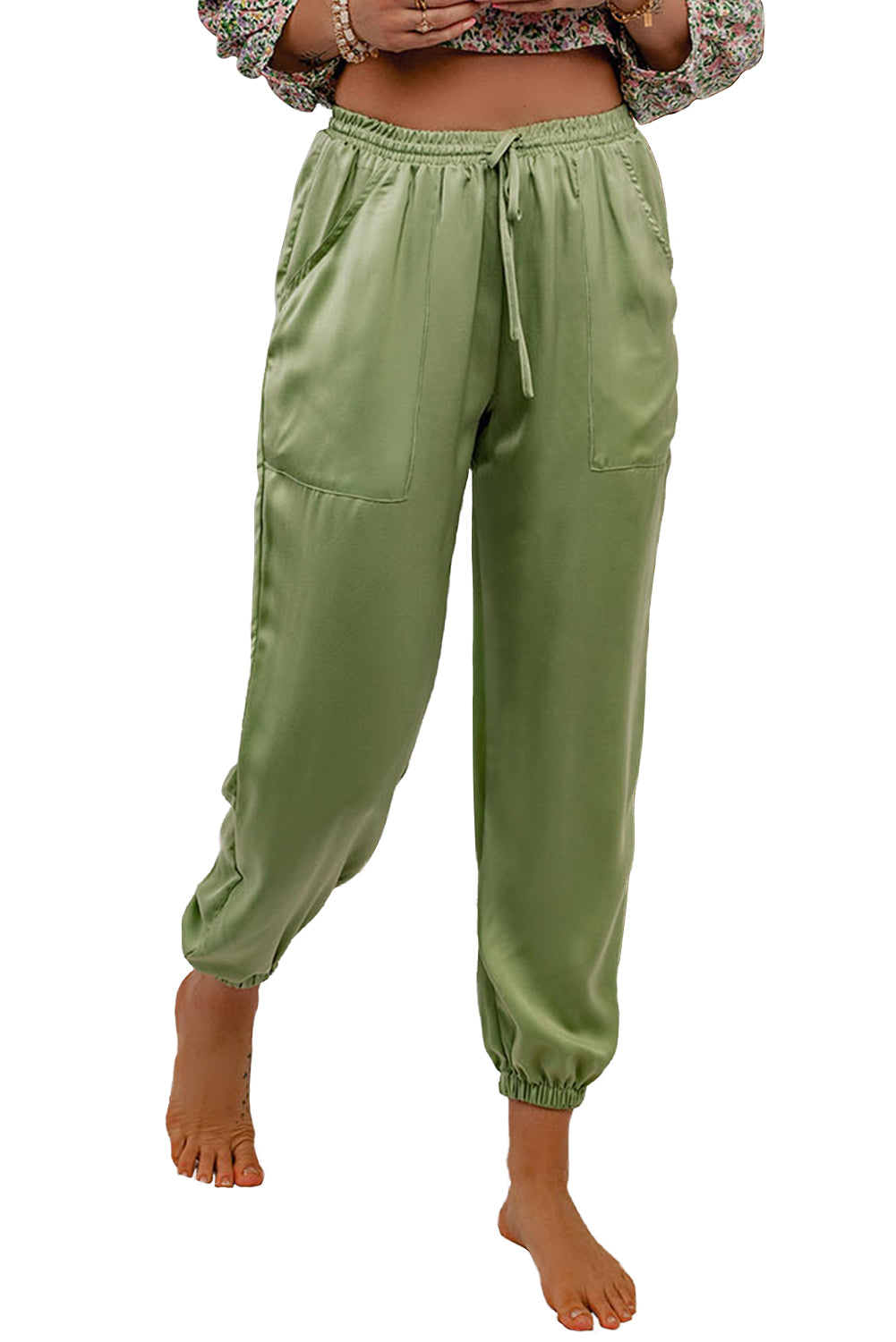 Pantalones deportivos casuales con bolsillos y cordón verde