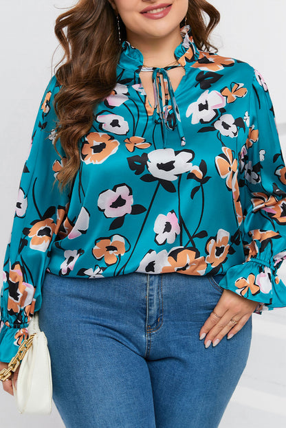 Blusa de talla grande con escote en V y estampado floral en azul cielo