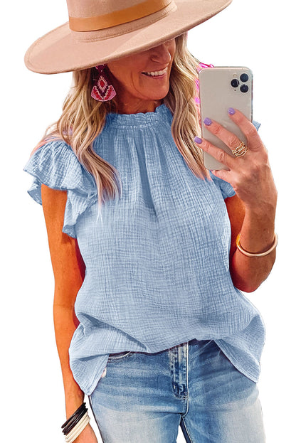 Blusa texturizada con mangas onduladas 