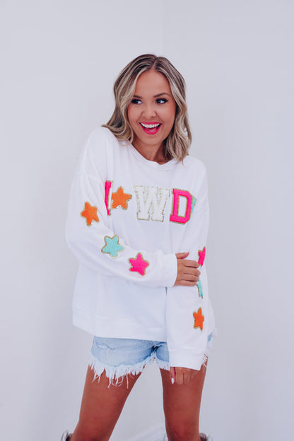 Vamp up your wardrobe with this fun pullover sweatshirt! The dazzling "HOWDY" graphic gives it a touch of pizzazz, and the star patterns on the sleeves make it extra darling. Made of 65% Polyester and 35% Cotton, you can choose from Black or White. Moodz Boutique has you covered!