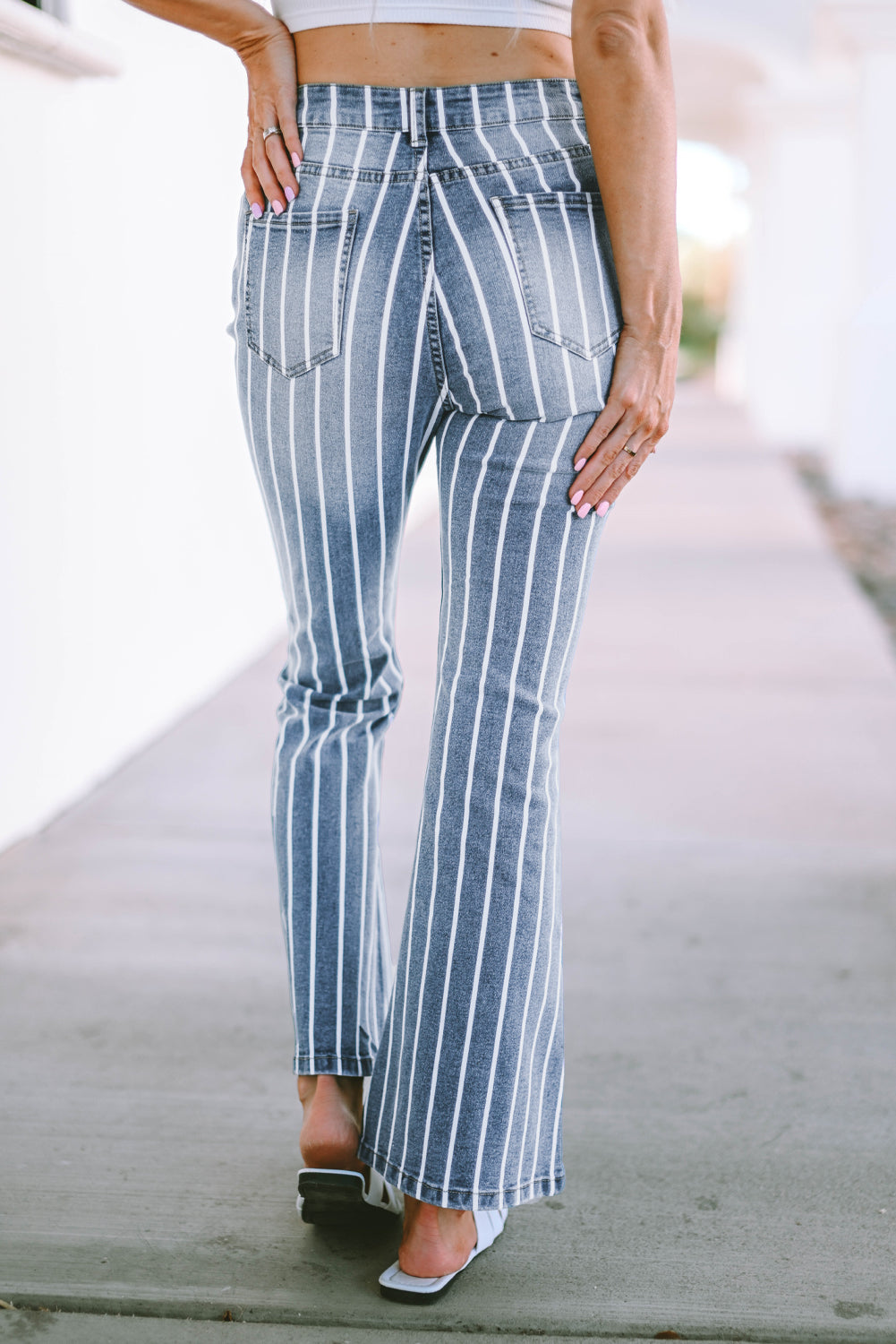 Show off your sporty side in our retro-fab sandblasted denim flares with v-stripes and light distressing! Flaunt the 5-pocket, zip-and-button design that's forever chic and forever in flare. Comfy-stretchy in a 71.5% Cotton, 25% Polyester, 2% Viscose, and 1.5% Elastane blend means these are a no-brainer.