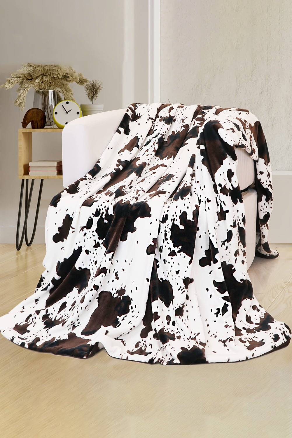 Snuggle up with this soft 'n cuddly cow-spotted or the fabulous Tie Dye blanket! Pamper yourself with luxurious plush fabric for the ultimate comfort experience. Cover up completely with this generously sized throw!