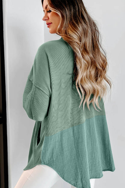 This cozy shacket is perfect for cooler weather! With its flap pockets and textured design, our Green Textured Tunic Shacket adds trendy, timeless style. Crafted from 95% Polyester and 5% Elastane, the shacket from Moodz Boutique will keep you snug and stylish all season long!