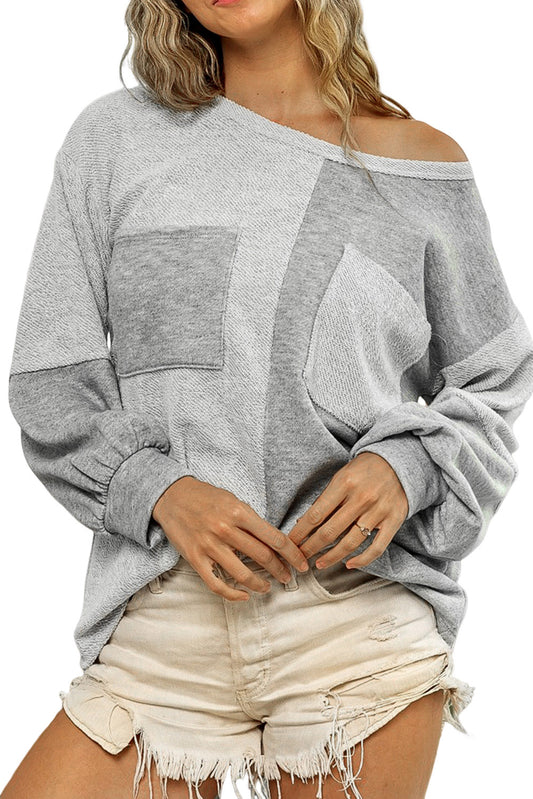 Blusa con doble bolsillo en el pecho y diseño de patchwork en contraste gris