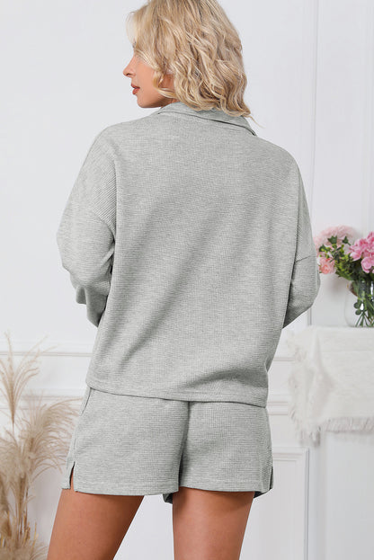 Conjunto de sudadera con cremallera de canalé gris y pantalones cortos de cintura alta