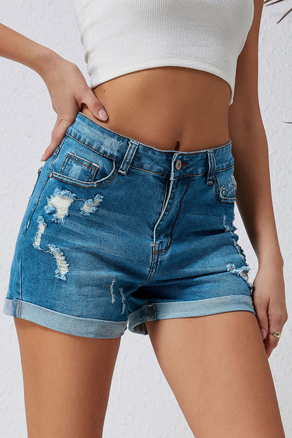 Shorts vaqueros rotos con bordado de diente de león en azul cielo