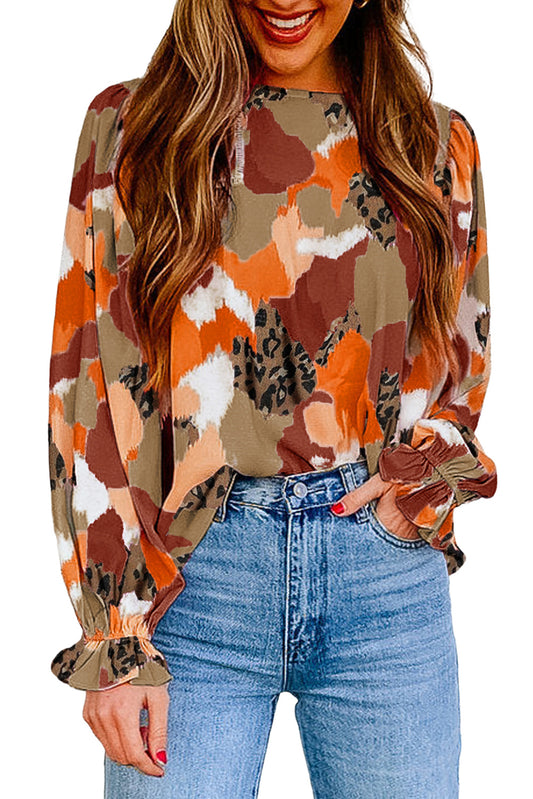 This flowy blouse is just right for feeling comfy and looking cute! Its puffy sleeves flatter all kinds of figures, and its abstract print is a total show-stopper. Perfect for night outs, vacays, weekends, dates — or just everyday fabness!