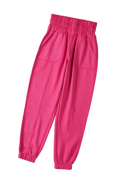 Pantalones jogger con cintura fruncida en rosa