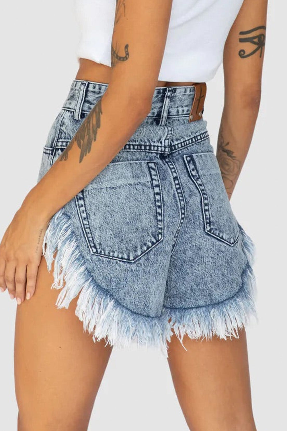 These acid-wash jean shorts will have 'em swooning! Their classic hue and sizzling fit will make sure you always look your best. The rounded hem with raw detail is a unique touch that won't go unnoticed. Slip into a pair and strut your stuff - you'll be looking fly AF from your waist to your thighs.