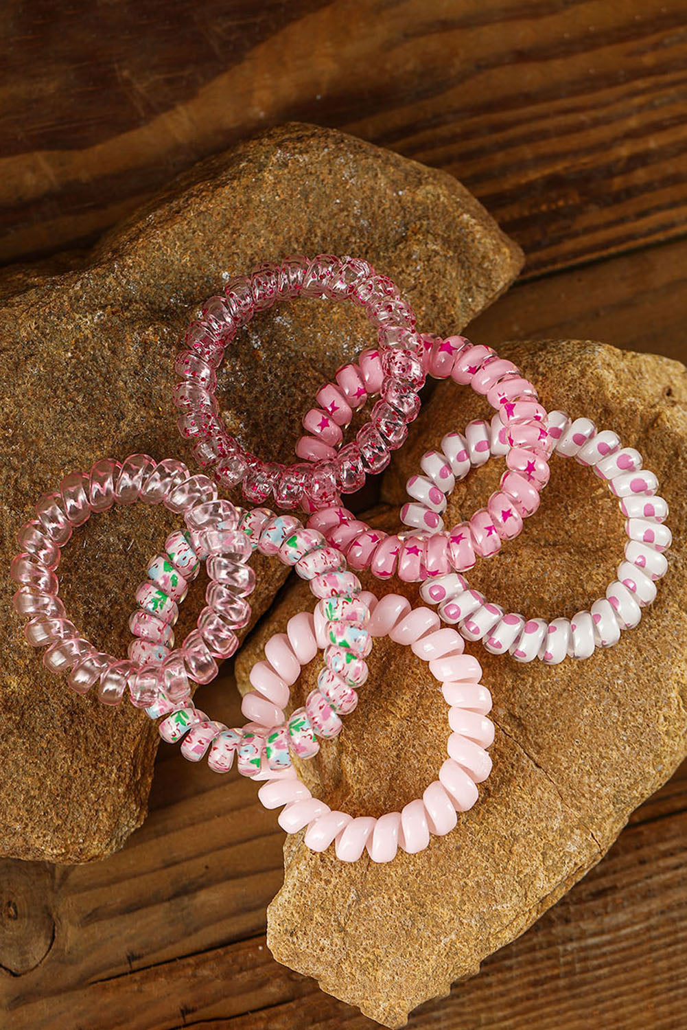 Conjunto de coleteros para teléfono con cordón y estrellas en color rosa con degradado