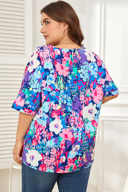 Blusa floral de talla grande con mangas dolman y escote en V en color azul cielo