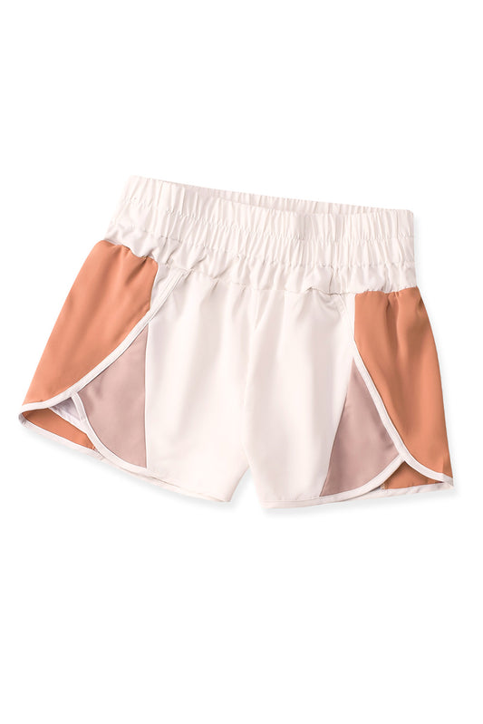 We got a real charge out of these high-waisted shorts! Not only are they sporty-chic – they’re also super smooth. The color-blocking adds a fun and fashionable touch, while the thick elastic waistband ensures a flattering (not to mention comfy!) fit. Wear ‘em with your fave sporty top or casual look – either way, you’ll be one stylish athlete! 100% Polyester, available in Apricot, Pink, or Blue.