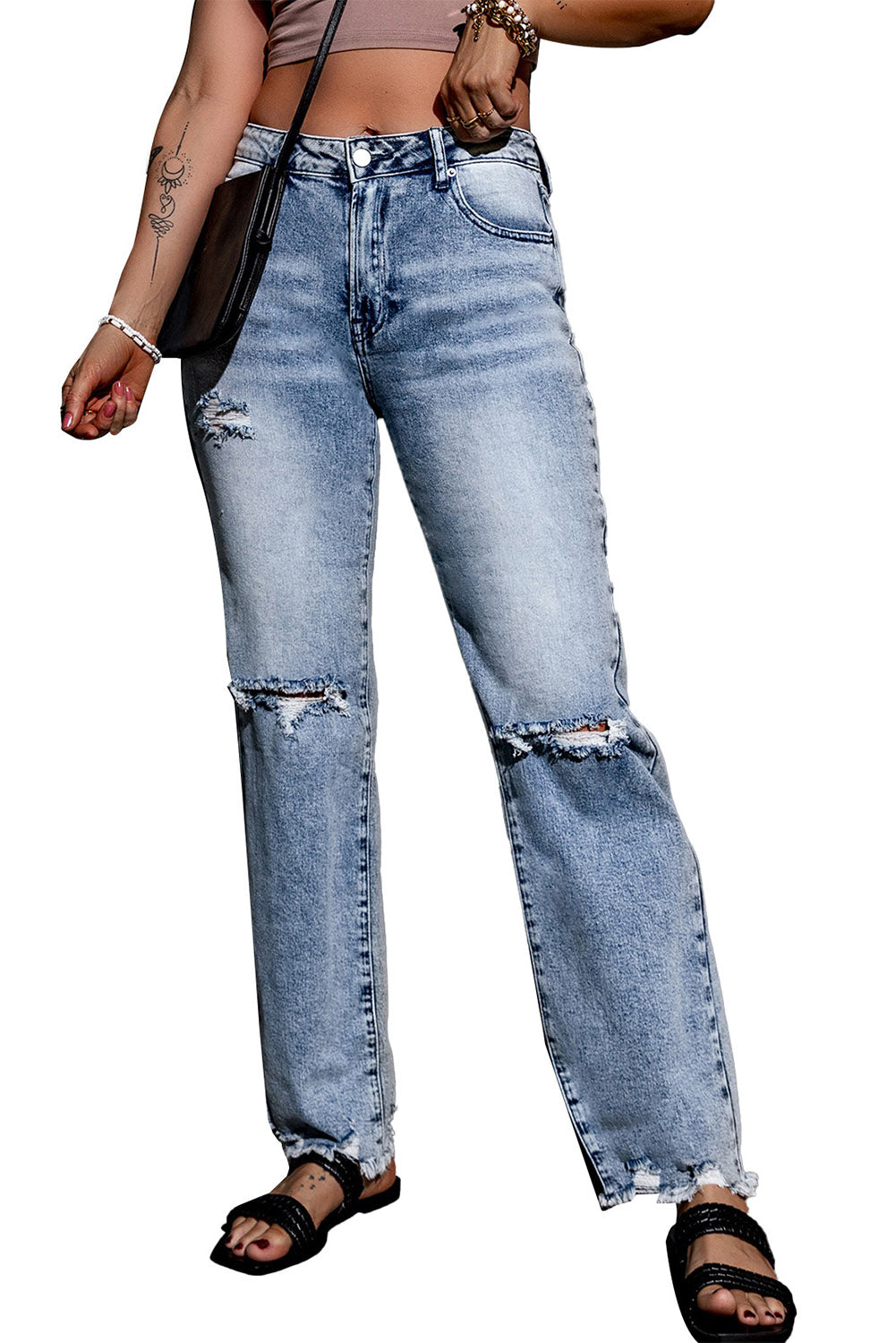 The faded finish brings an unexpected edge to these jeans - guaranteed to make 'em look twice! Hits of shredded details elevate yer style game, while the high-waist and wide-leg combo flaunts yer long and lean pins. Expand yer wardrobe options with a shirt, tank, jacket, sneaks, and sanda's and look oh-so-stylish. Material: 93% Cotton, 5% Polyester and 2% Elastane.