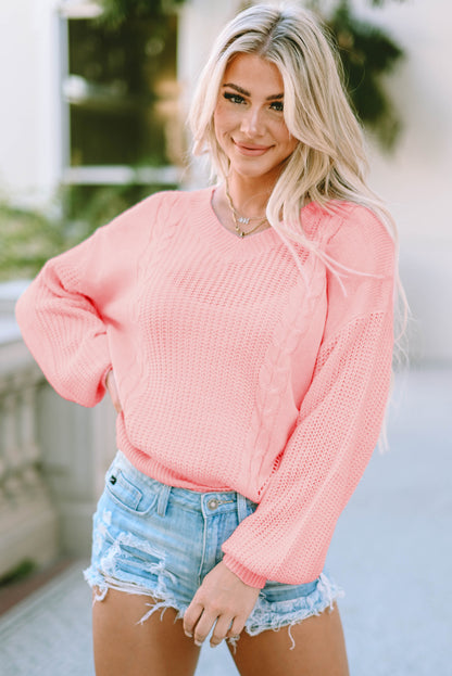 Suéter de punto trenzado con mangas largas y cuello en V de color rosa