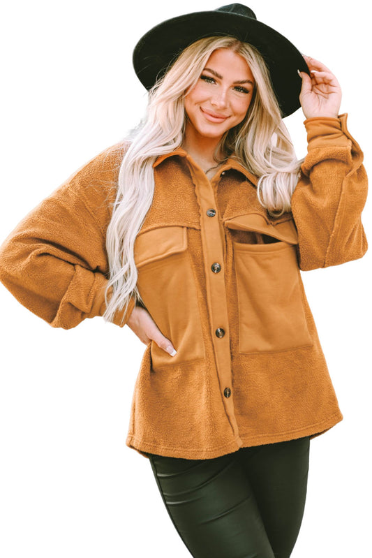 This brown-hued moto-jacket is perfect for any fall shindig. Flap pockets and a turn-down collar add to its relaxed yet chic style. Equally fab for chillin' and stylin', this jacket partners perfectly with a long-sleeve tee and jeans for a totally on-trend ensemble. Crafted from 100% Polyester.