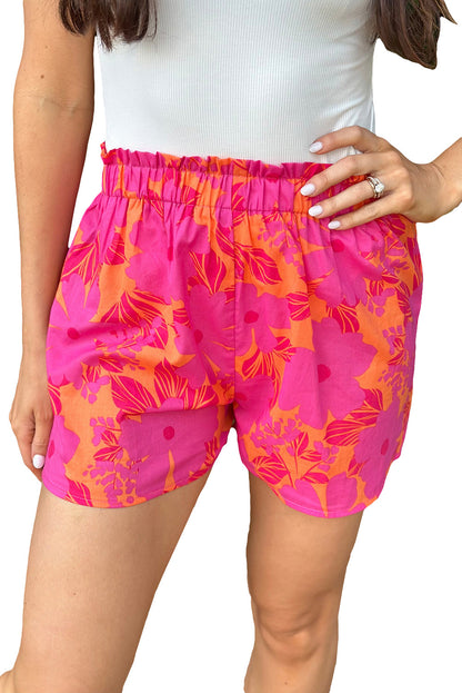 Pantalones cortos con cintura fruncida y estampado floral en color rosa