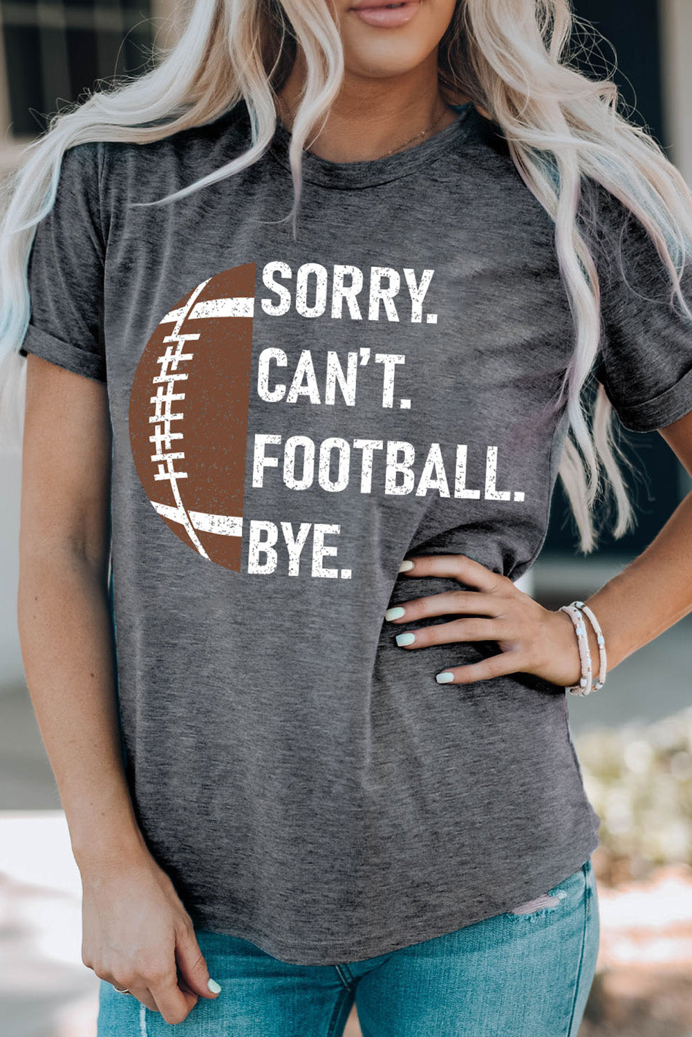 Show your love for the game with this chic Football Graphic tee! This classic crewneck offers ultimate comfort and breathability - crafted with a soft combination of 95% Polyester and 5% Elastane. Ready, set...Game Day!