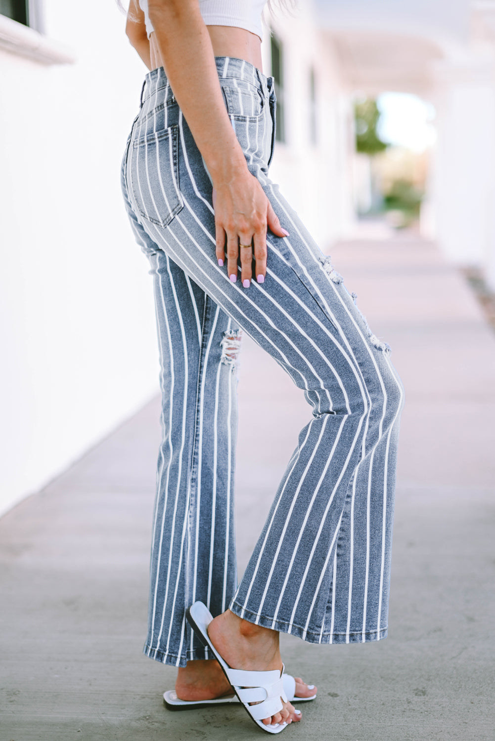 Show off your sporty side in our retro-fab sandblasted denim flares with v-stripes and light distressing! Flaunt the 5-pocket, zip-and-button design that's forever chic and forever in flare. Comfy-stretchy in a 71.5% Cotton, 25% Polyester, 2% Viscose, and 1.5% Elastane blend means these are a no-brainer.