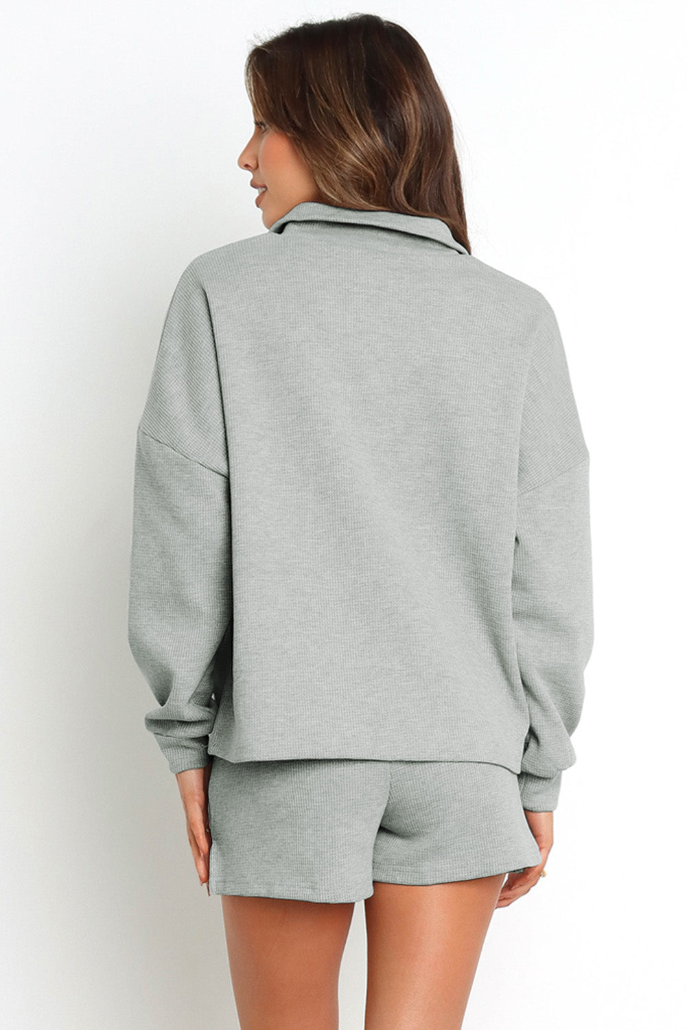 Conjunto de sudadera con cremallera de canalé gris y pantalones cortos de cintura alta