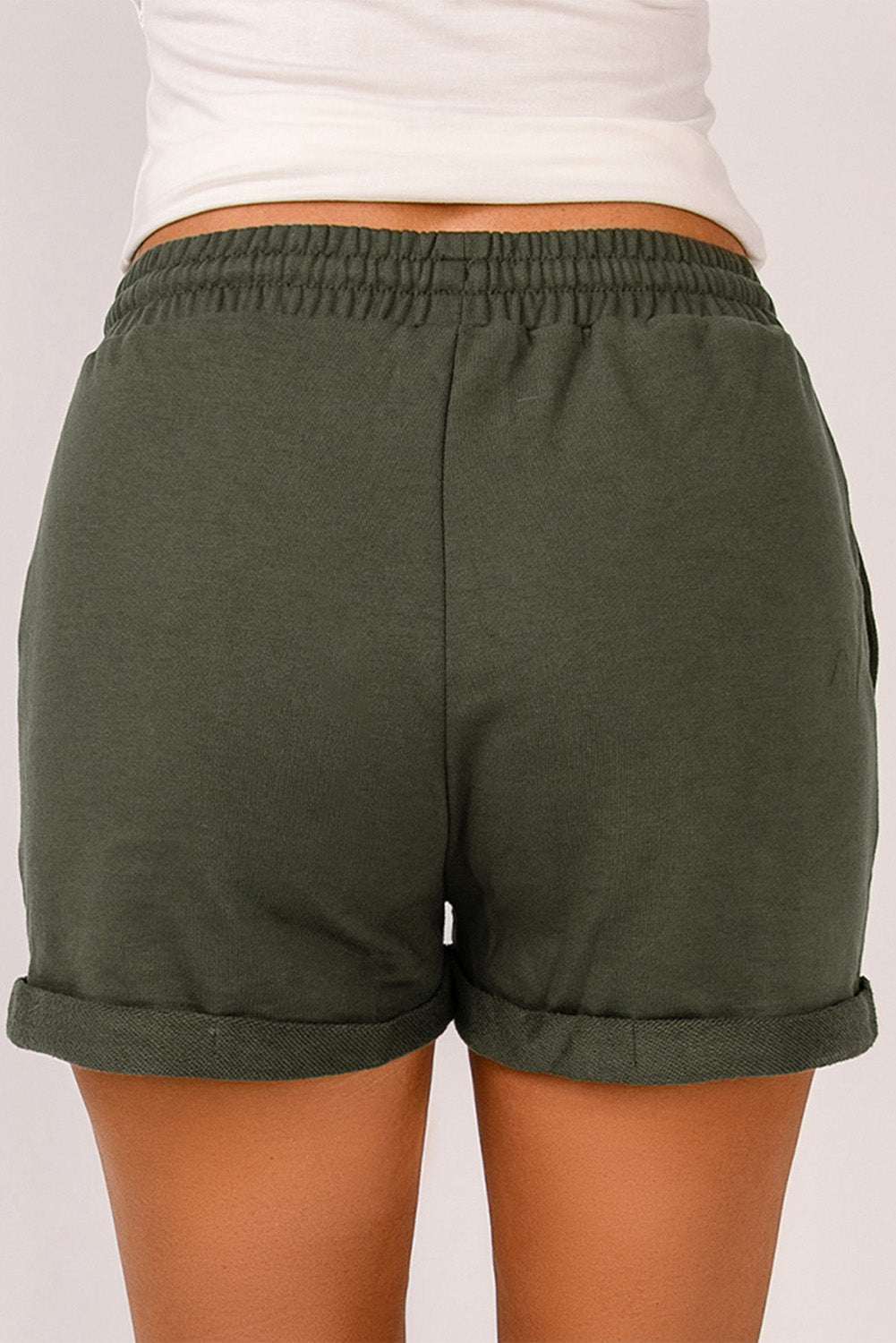 Score these Tie Waist Cuffed Lounge Shorts for major style points! They're timeless—they'll never go out of fashion. Plus, pockets on the sides make 'em great for carrying must-haves like keys and phone. We know you'll swoon over the lightweight feel and the oh-so-soft fabric—75% Polyester 25% Cotton in colors like Green, Gray, and Black.