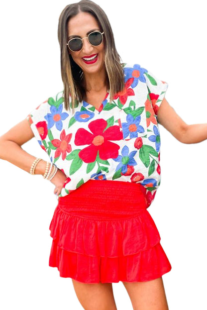 Blusa con escote en V y flores 