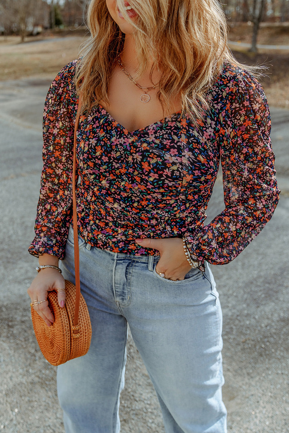 Flatter your curves with this stylish V-neck! Add a playful touch with trendy bubble sleeves, and rock a floral print for a girly and chic vibe. Wear this versatile blouse up or down for any occasion - (you'll be the bell of the ballot!) 100% Polyester.