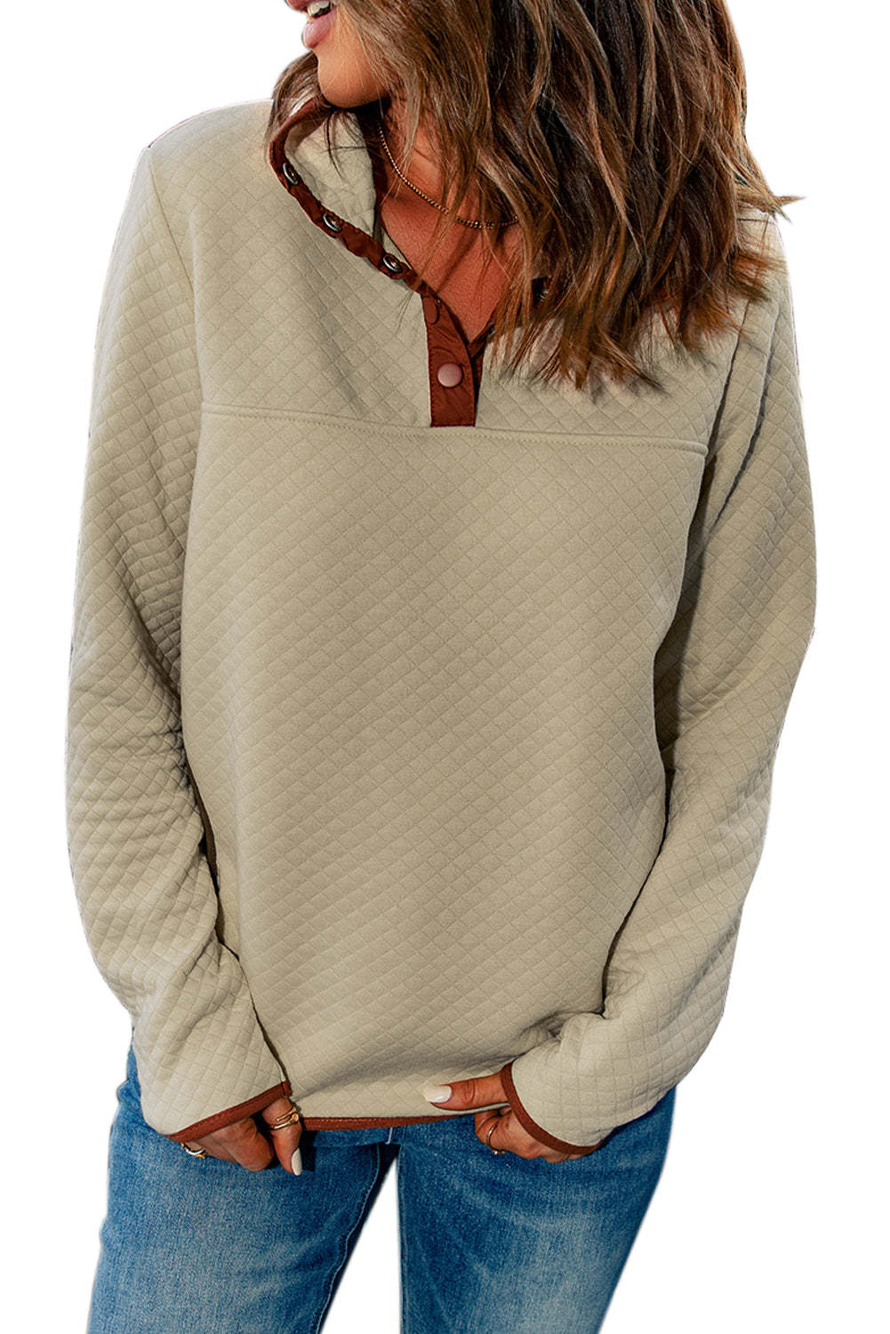 Introducing the Geometric Textured Pullover Sweatshirt. This breathable, cotton blend sweatshirt is accentuated with a contrast placket and side pockets for extra style. Soft and comfortable, it's available in beige from Moodz Boutique. 95% Polyester, 5% Elastane.