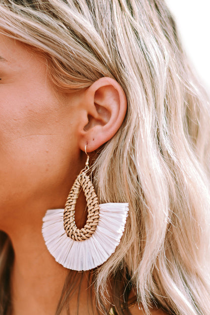 Elevate any look with these bohemian-inspired earrings! The unique semi-circle shape and intricately woven design make them special, while the hollow design keeps them lightweight for all-day comfort. Made of alloy material from Moodz Boutique.