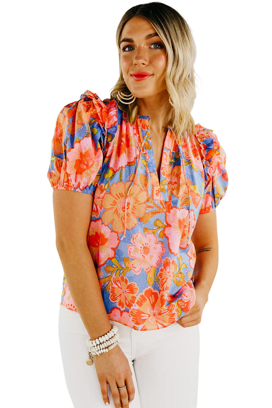 Blusa con escote en V y mangas abullonadas con estampado floral multicolor en talla grande