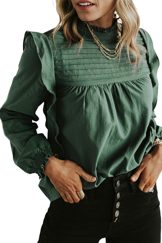 Blusa con cuello alto, mangas abullonadas y volantes en color verde sólido