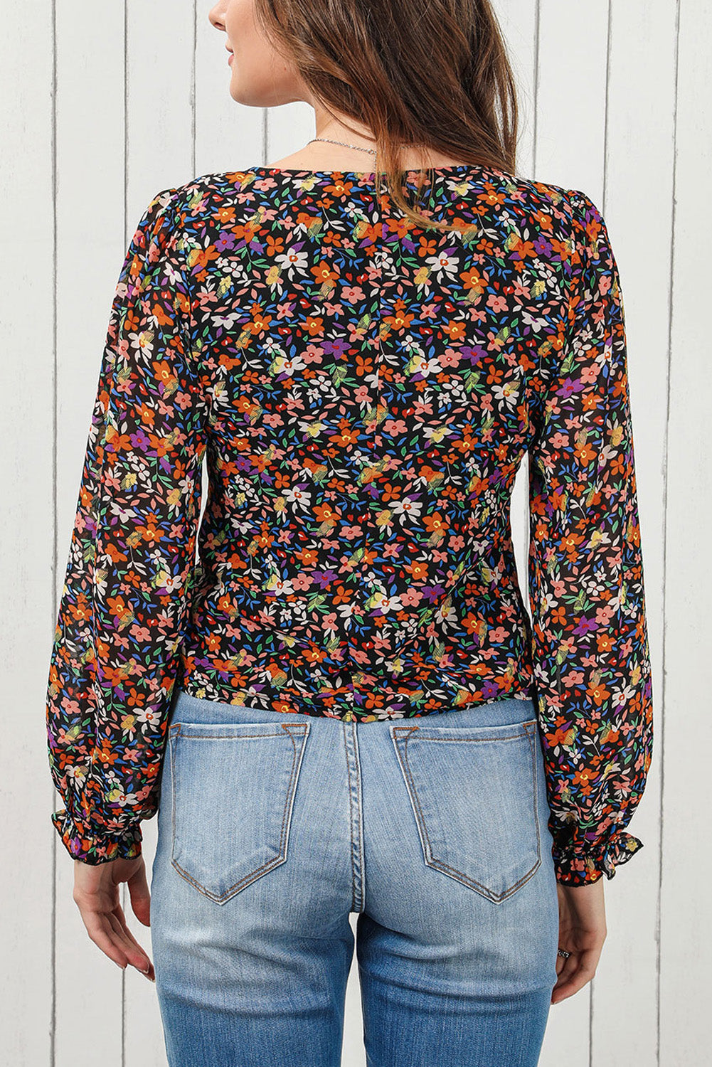 Flatter your curves with this stylish V-neck! Add a playful touch with trendy bubble sleeves, and rock a floral print for a girly and chic vibe. Wear this versatile blouse up or down for any occasion - (you'll be the bell of the ballot!) 100% Polyester.