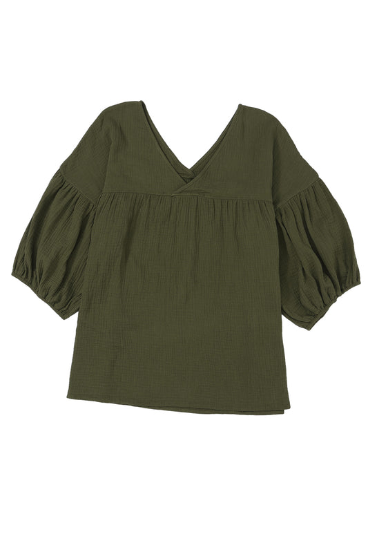 Blusa babydoll con escote en V y mangas con brazalete, de color verde texturizado