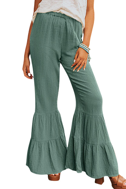 Sashay into the room with these stylish, textured high-waist pants and flaunt those frilly bell bottoms! Comfy with a soft waistband, these pants are ultra-versatile, so you can dress 'em up or down. 100% Cotton in Green, Rose, or classic Black? Talk about a win-win!