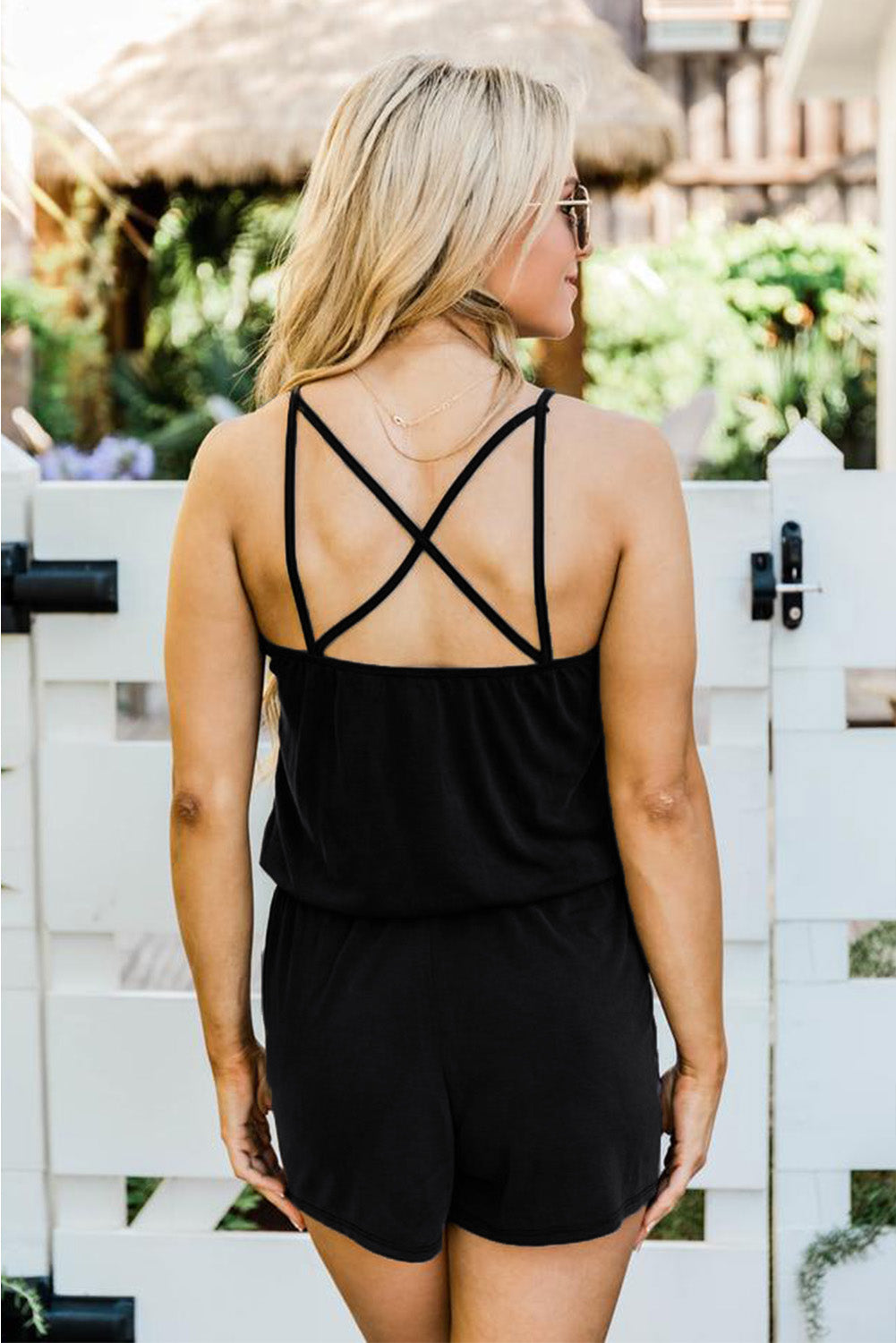 We're crushin' hard on this drop-dead gorgeous romper with its oh-so-classic criss-crossing design. The bodice's tank-style plus the soft material? A winning combination for sure! For a face-smackingly fabulous look, pair with wedges and a flashy bracelet set. 95% Polyester, 5% Spandex. Pink and Black. Boom!