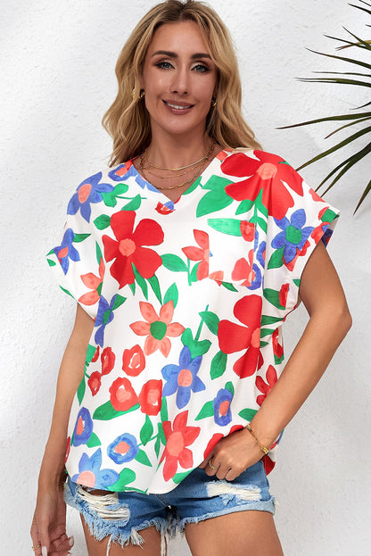 Blusa con escote en V y flores 