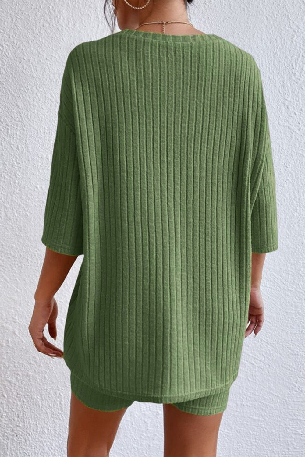 Snuggle up in style with this Slouchy Ribbed Knit Set! With a classically chic V-neck design, this two-piece look provides a relaxed 'n' comfy fit while giving you plenty of styling options. Available in Apricot, Green, Gray, or Black and crafted from 85% Polyester, 10% Viscose and 5% Elastane—it's the perfect pick for easy elegance.