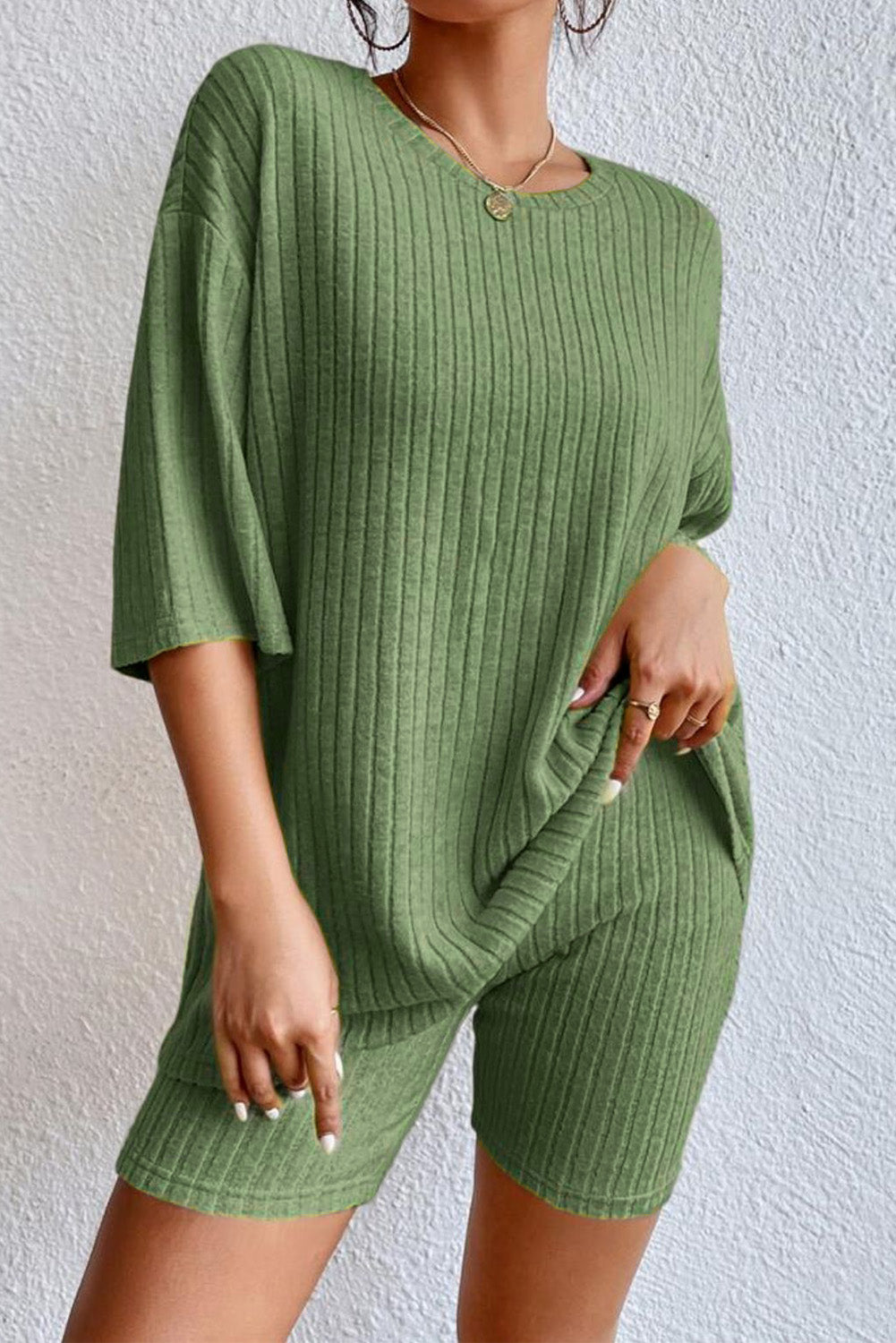 Snuggle up in style with this Slouchy Ribbed Knit Set! With a classically chic V-neck design, this two-piece look provides a relaxed 'n' comfy fit while giving you plenty of styling options. Available in Apricot, Green, Gray, or Black and crafted from 85% Polyester, 10% Viscose and 5% Elastane—it's the perfect pick for easy elegance.