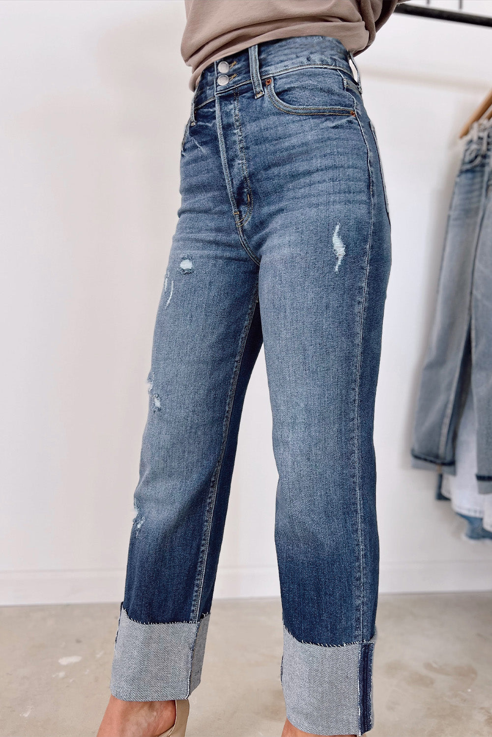 Experience the premium pampering of trendiness! Crafted from denim perfection, these jeans provide you with durability and a flattering fit. The high-waisted design amplifies your curves and elongates your look. Step into the effortlessly cool swagger of the straight-leg style.