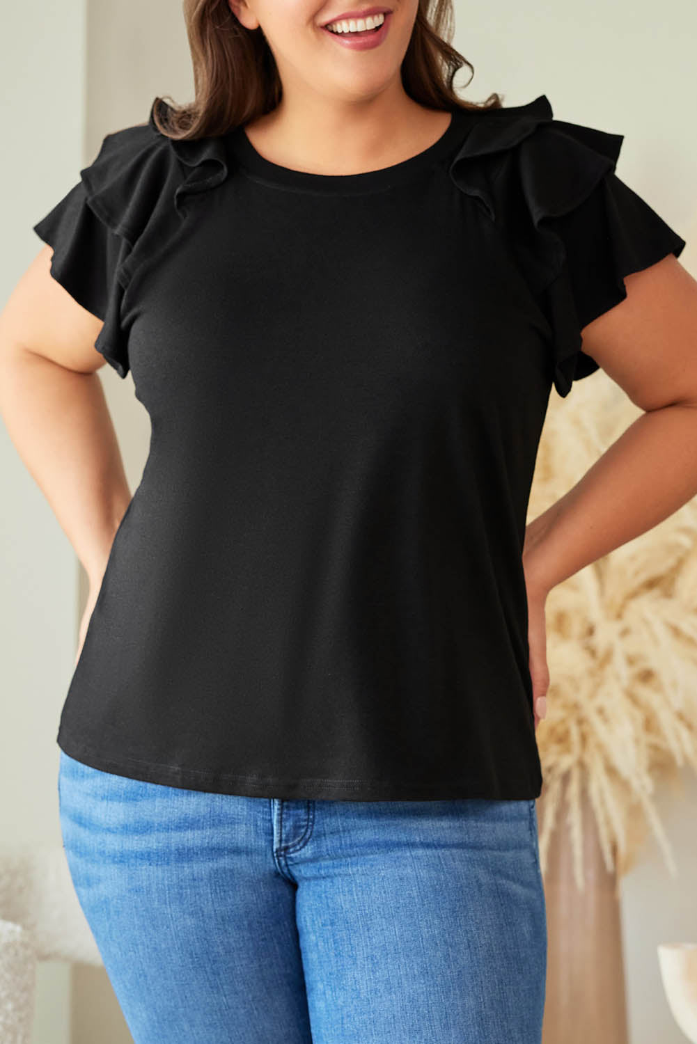 Blusa con mangas escalonadas